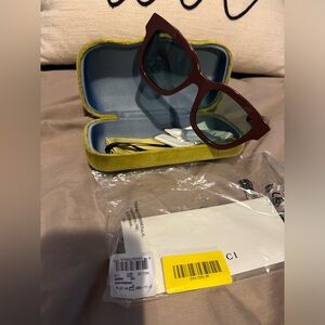 Brand new Gucci Sunglasses burgundy and black frames